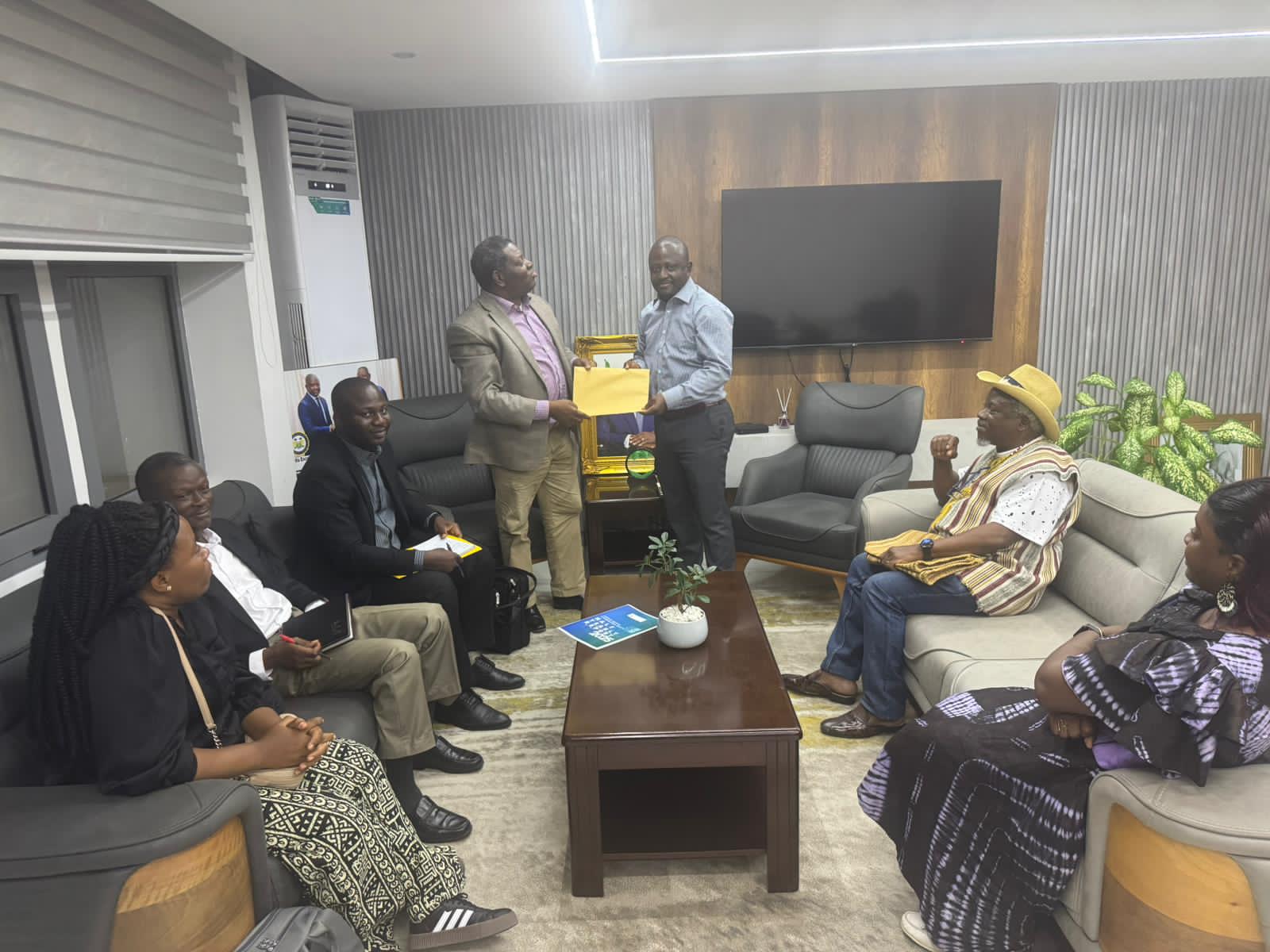 ERA delegation presenting a formal letter to Sierra Leone's Minister of Justice, Mr. Alpha Sesay